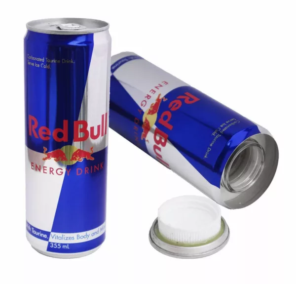 Red Bull can on white background, open with white cap and logo, sitting on white surface with no visible contents inside.