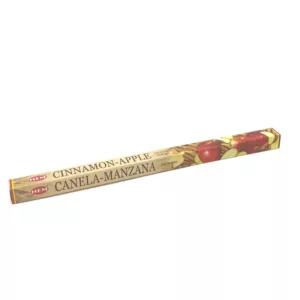 A colorful, folded paper tube with a cinnamon apple design, tied with a ribbon and labeled Cinnamon Apple - Hem on a white background.