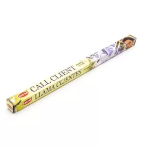 White stick with purple label cal client on it, made of plastic or paper material. No other visible information.