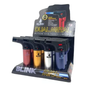 display case featuring a variety of metallic torches, including a dual metal torch at the top. The case has a clear front and a silver frame with metal bars. The label on the case reads Blink.