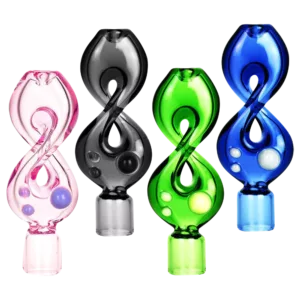 Three intricately designed glass pipes in green, blue, pink, purple, black, and turquoise, with curved and straight shapes, well lit and reflecting in the bottom left corner.