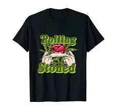 Black t-shirt with red heart graphic on woman's hand, 'rolling stone' slogan. Toxic Teez brand.