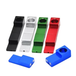 Small, magnetic, folding hand pipe with a blue, green, and red cube design and a metal surface. Perfect for on-the-go smoking.