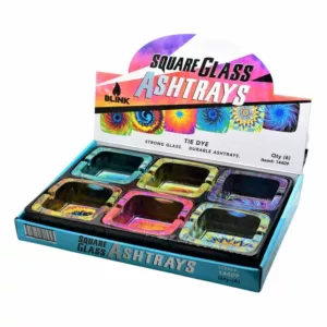set of square glass ashtrays with a colorful, tie-dye design made up of triangles, squares, and circles. They are rectangular in shape with a flat bottom and can be used for smoking or as a decorative item.