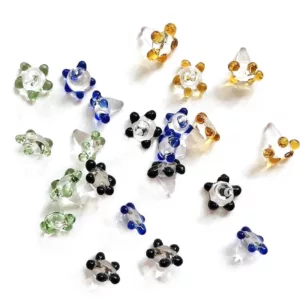6 colorful, symmetrical glass beads on a thin wire for smoking accessories.