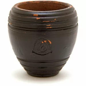 Rugged, worn black pot with brown wooden base and handle, showing signs of age and use. Perfect for smoking.