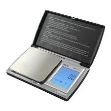 Silver/black scale BT2-201-AWS shows weight in grams/kilos, open display, for sale on smoking company website.