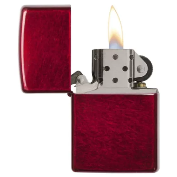 A sleek, modern red lighter with a flickering flame on a white background.