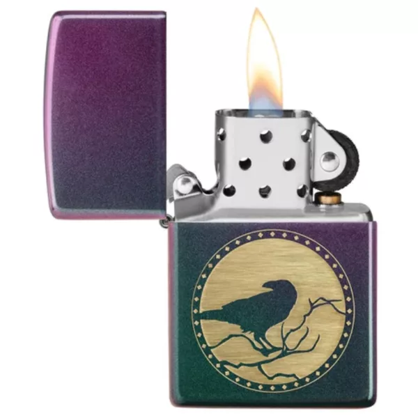 Raven-themed Zippo lighter with gold trim and black body. Features a perched raven with closed eyes on a purple-blue gradient background. Minimalist and mysterious design.
