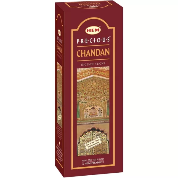 Wooden box of Precious Chandan incense with intricate carvings, sweet-spicy scent, and traditional Indian motifs.