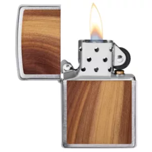 WoodChuck Cedar Zippo lighter has a wooden lid and silver body, with a blue flame and wood grain font.