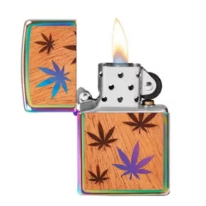WoodChuck Leaves Zippo lighter: earthy, wooden design with cannabis leaf etchings on metal body, perfect for holding tobacco or rolling papers.