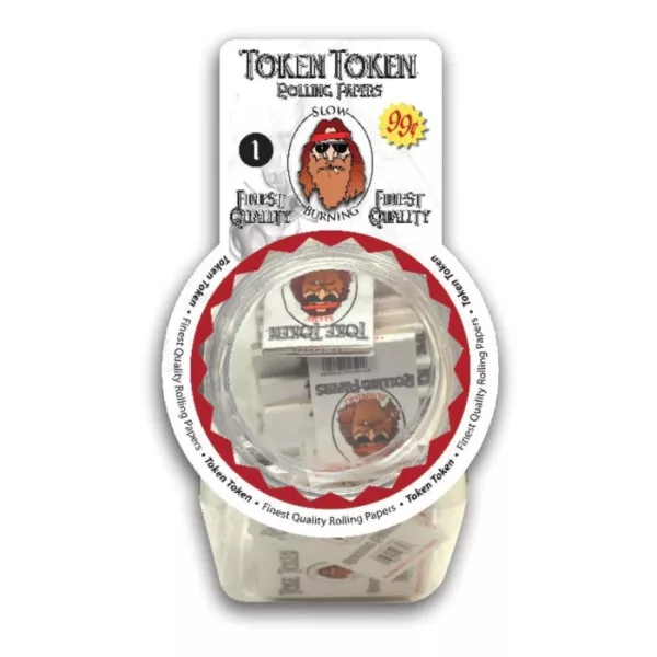 Clear plastic container with white label and red and white logo, containing small plastic bag with matching label and logo, containing Toke Token 1.0 White (230).