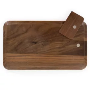 Stylish, large rectangular tray made of walnut wood with smooth surface, large handle, and four legs for stability. Natural finish enhances wood's beauty.