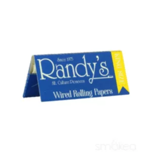 Blue rectangular pack of king size rolling papers from Randy's. Clear plastic window, blue and white design, easy to carry and store, environmentally friendly and sustainable.