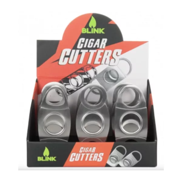 The Blink Metal Cigar Cutter (14423) features a sleek, modern design made of stainless steel. It has a minimalist display case made of clear plastic for easy viewing. Perfect for cutting tobacco leaves and rolling cigarettes.
