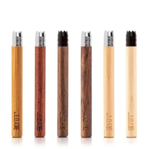Set of six wooden cigarette holders in different colors and sizes. Sleek, modern design. High-quality materials for durability. Suitable for different occasions.