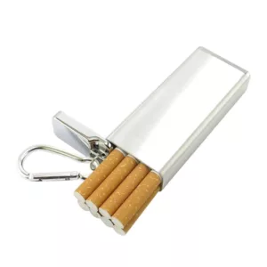 Sleek stainless steel lighter with 5 cigarettes in plastic case, white filters, and keychain attachment, featured on Tiny Cigarette Case page on smoking company website.