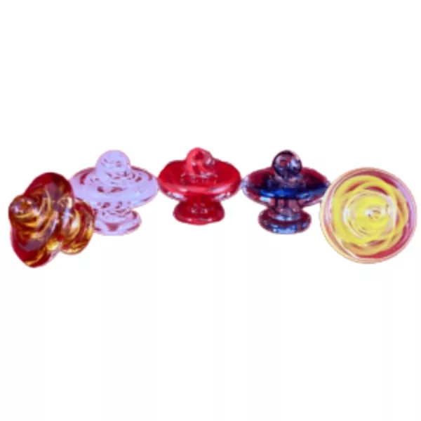Five colorful glass saucers in a circular formation, each with a small opening on top and a raised edge. NN1139.