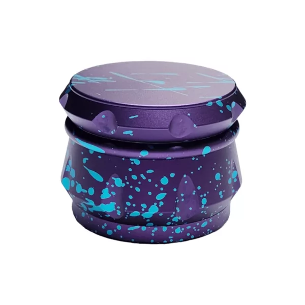 Round plastic container with purple and blue spattered design and black lid. Perfect for grinding and storing smoking accessories.