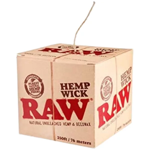 A high-quality image of a cardboard box containing 250ft of raw hemp wick, with white text on it and the wick hanging out of the box. The background is white and there are no other objects in the image.
