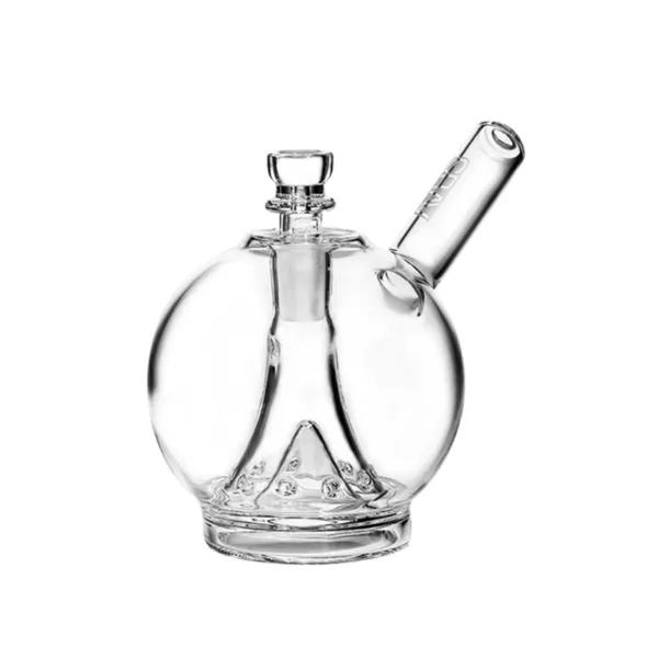 The Wobble Bubbler by GRAV is a unique, transparent glass bubbler shaped like a golf ball with a small hole at the top. It has a light blue and purple tint. The image is clear and well-lit with no visible reflections or distortions.