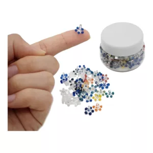 Hand holding jar filled with colorful beads, NN272, from Smoke Company. 2 for 1 deal.
