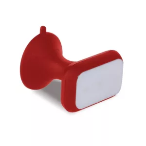 Red plastic phone holder with white label and suction cup for attaching to walls or surfaces. Convenient for phone use.