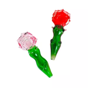 Green and red smoking pipe with clear glass stem, red/green bowl, white background.