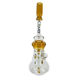Glass bong with clear base, yellow/purple stem, clear bowl, purple/green base design, and clear flexible hose.