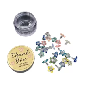Colorful metal daisies on black background with 'thank you' container. Playful and cheerful design.