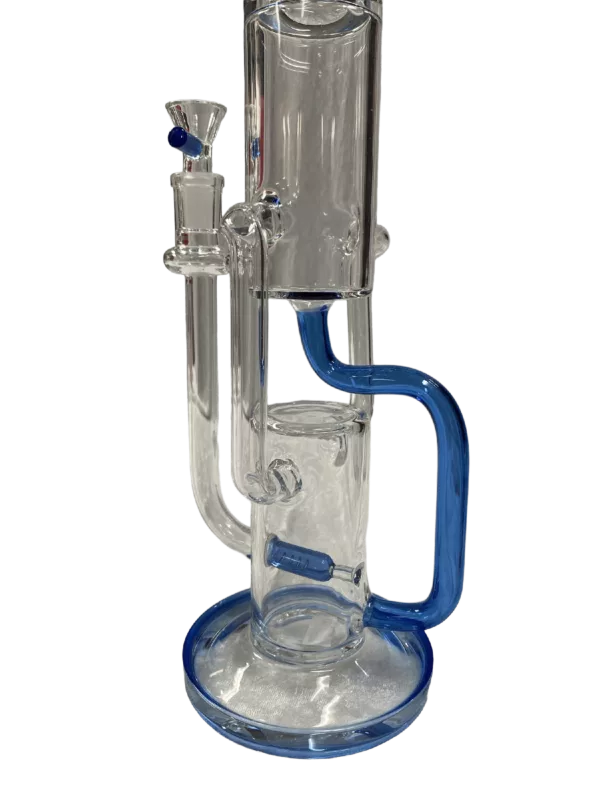 blue glass bong with a clear base and two bowls connected by a clear tube. It sits on a metal stand with a blue handle and is lit up from the side.