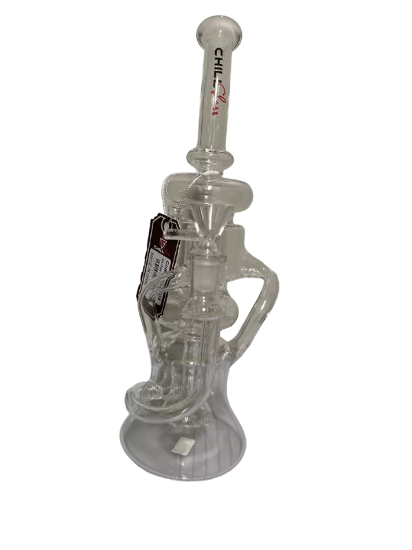 Glass bong with clear stem and base, small and large bowls connected by clear tube. Side handle attached to stem, other handle attached to base. Base has small hole in center. Bong sits on clear base with small hole in center.
