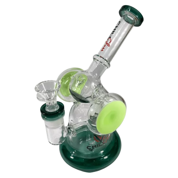 A unique, curved glass bong with a green accent, featuring a small percolator and a wide, flared downpipe with a silver ring decorated with green beads.