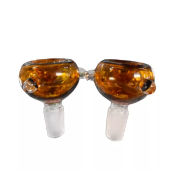 This image displays the Basic Bubble Bowl with Knobs 14M, a pair of glass pipes with a brown, amber-colored glass exterior and clear glass interior connected by a clear plastic stem. The pipes sit on a white background.