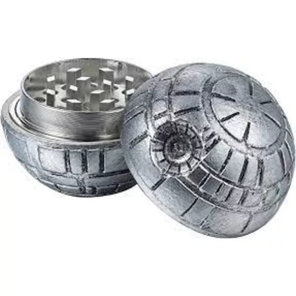 Death Star shaped silver metal grinder with 3 chambers, sitting on white surface. #StarWars #smoking