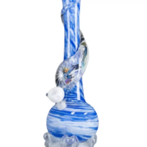 Blue and white glass vase with swirling design, round base and narrow neck, sitting on white surface.