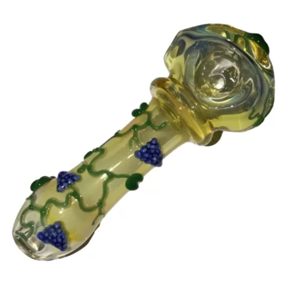 Handcrafted glass pipe with blue, yellow, and green swirls, featuring a small flower on top and a clear base with a 4-hole spoon design by Randall Strait.