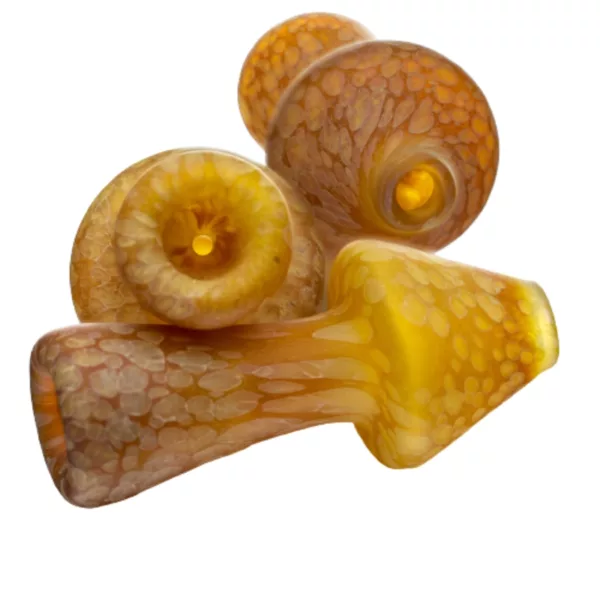 Stonetech's Stone Chill offers a variety of glass pipes with yellow and brown stripe designs, available in clear or transparent options.