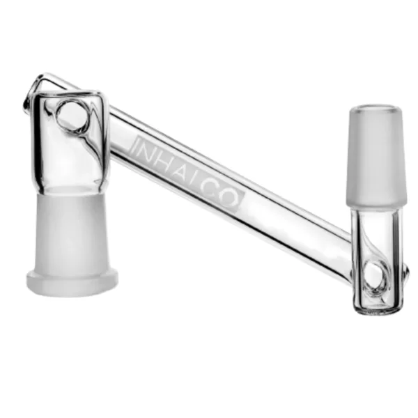 A clear glass dropper with a plastic tube and handle, used for dispensing liquids. The dropper has a small spout and a thumb grip on the handle. It is held in place by a mechanism.