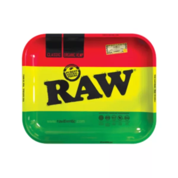 A large rectangular metal tray with the words RAW in red, green, and yellow on the front, appears empty and blurry.