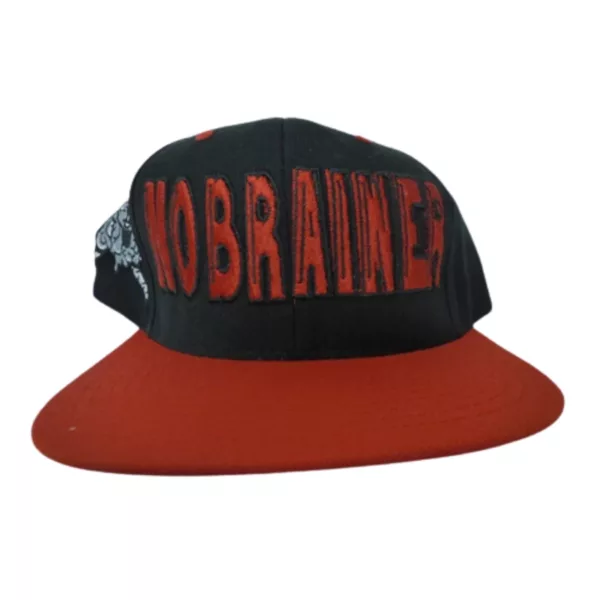 No Brainer snapback hat with black and red color scheme, white No Brainer text on front, large white Knobs Brains logo on back, adjustable metal buckle strap, black visor, 100% cotton, machine washable.