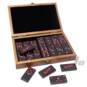Handcrafted wooden box with black and red dots holds 6 dominoes for games and decor.