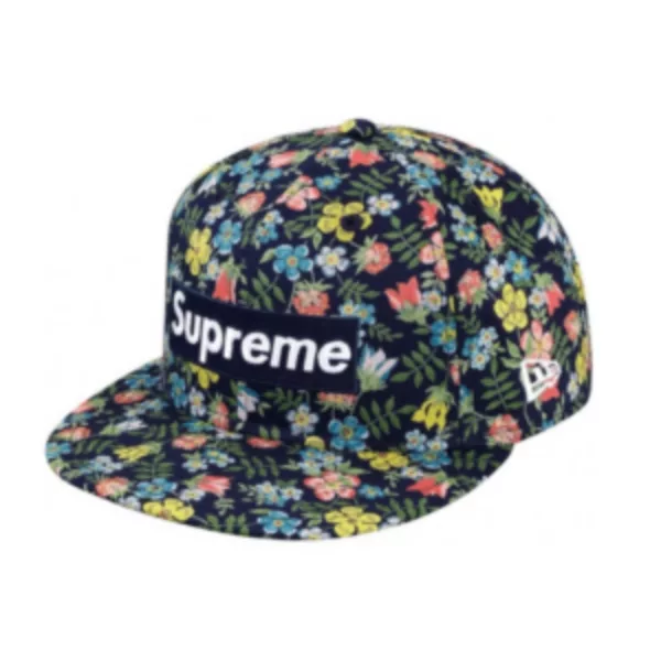 Floral print navy blue cap with adjustable strap and Supreme logo on right side. Perfect for outdoor activities.