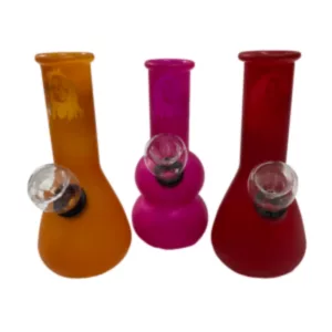 Cheerful, colorful glass water pipes for smoking marijuana, available in red, orange, and purple.