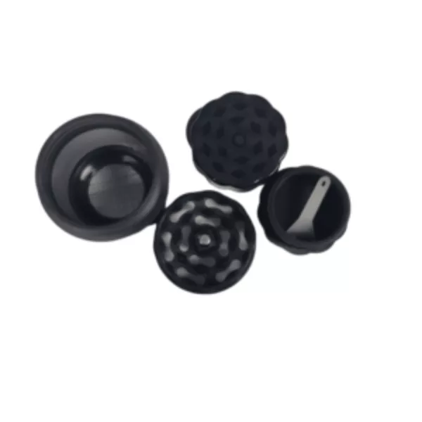 Modern 4-part plastic bottle grinder with sleek black rubber balls and circular holes for easy use.