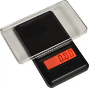 Compact digital scale with red display for precise weighing of small objects. Suitable for use in a smoking company.
