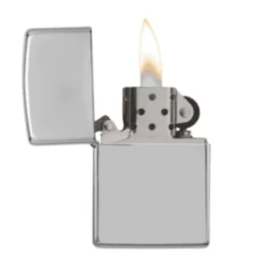 Chrome Zippo lighter with open flame and hinge top. White background.