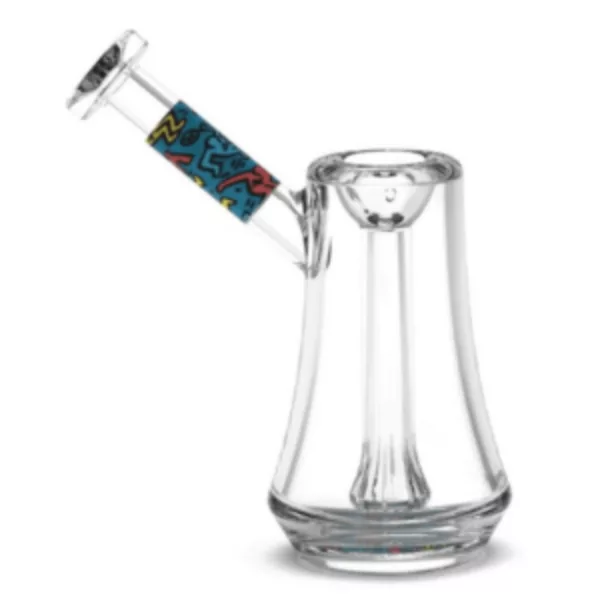 Bubbler - K.Harring has a clear glass body with blue and white line pattern, plastic mouthpiece and a small finger ring on the middle. It has a small indentation on the bottom to prevent sliding.