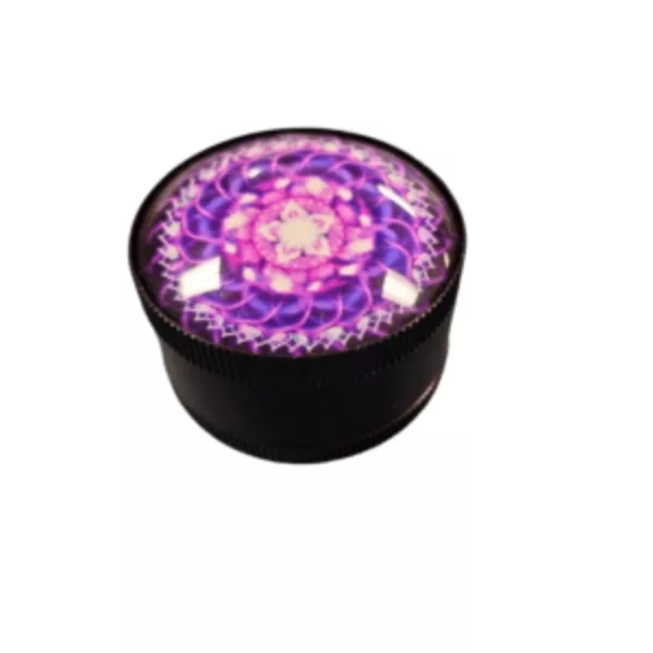 Round black container with purple and white floral design on white background.